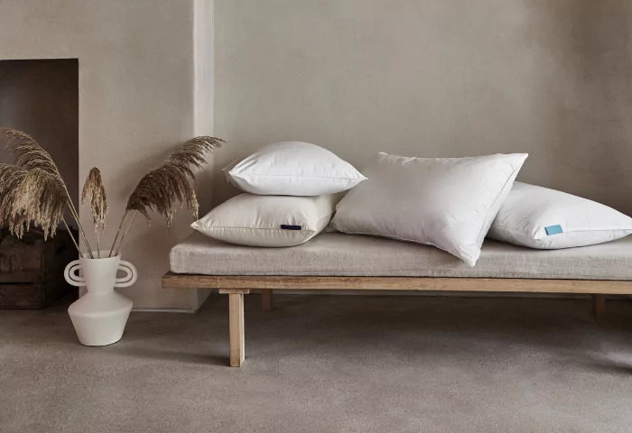 Pillows and mattresses in a boho bedroom