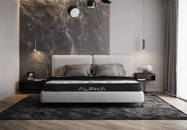 Modern bedroom with a bed featuring an Alpha mattress on a dark rug.
