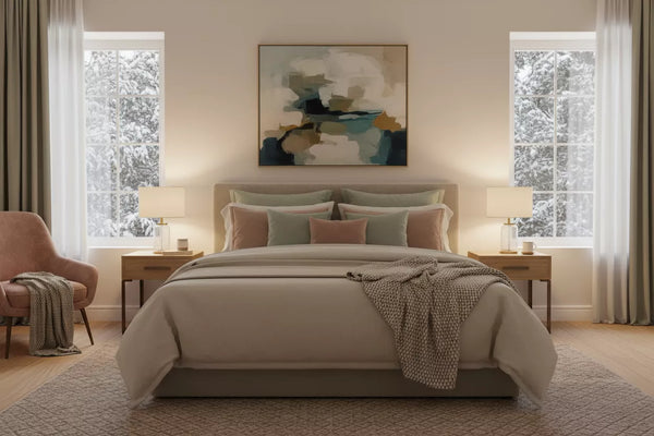 Modern bedroom with a bed, nightstands, and abstract art on the wall.