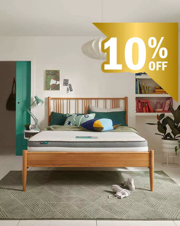 Wooden bed with Silentnight mattress in a room setting, promotional banner with 10% off text.